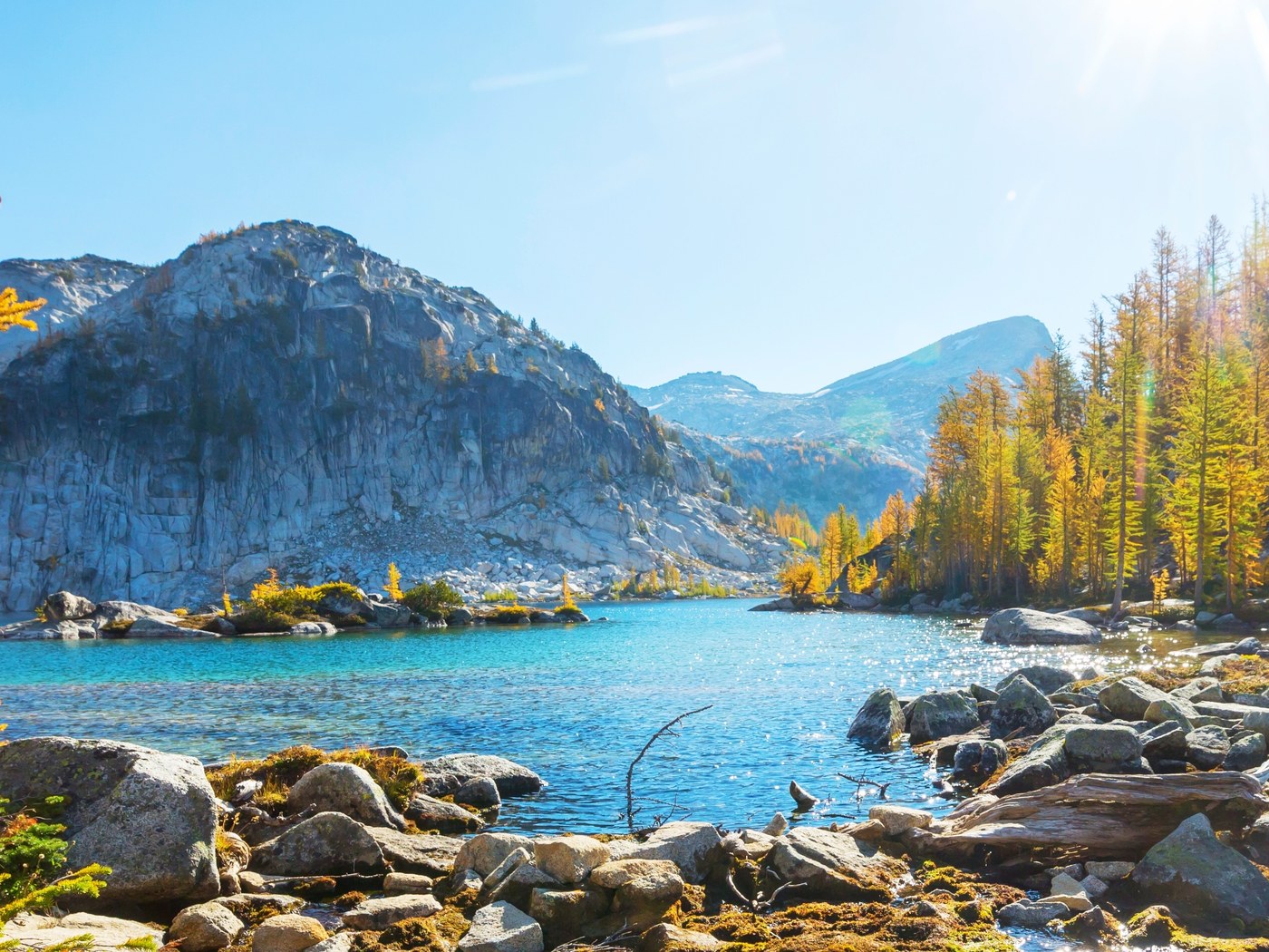 Golden larches and turquoise water at an alpine lake in the Cascades east of Seattle